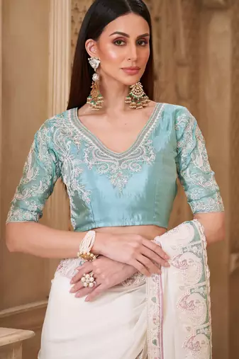 Cream georgette silk blend embroidered saree with unstitched blouse piece