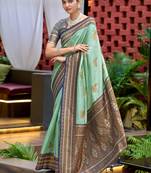 Teal green silk blend with woven saree with unstitched blouse piece