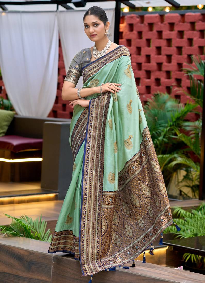 Teal green soft silk blend with woven work designer party wear festive saree with unstitched blouse piece