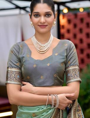 Teal green silk blend with woven saree with unstitched blouse piece 5