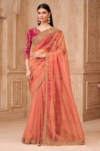 Orange georgette embroidered saree with unstitched blouse piece
