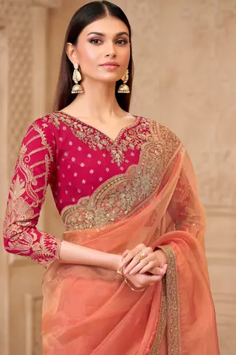 Orange georgette embroidered saree with unstitched blouse piece