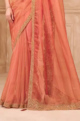 Orange georgette embroidered saree with unstitched blouse piece