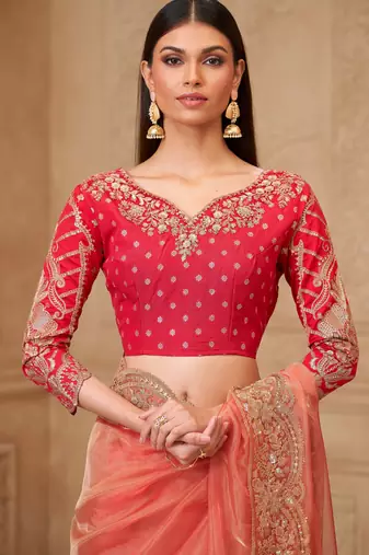 Orange georgette embroidered saree with unstitched blouse piece