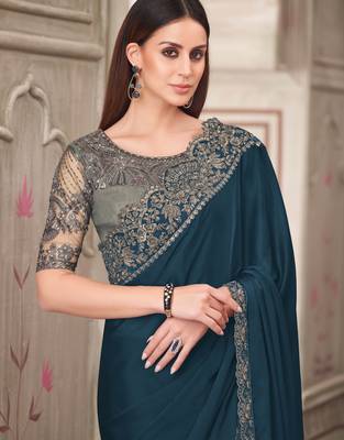 Blue soft silk blend embroidered saree with unstitched blouse piece 2