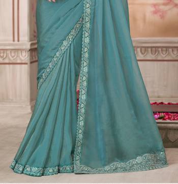 Turquoise soft silk blend embroidered saree with unstitched blouse piece 3