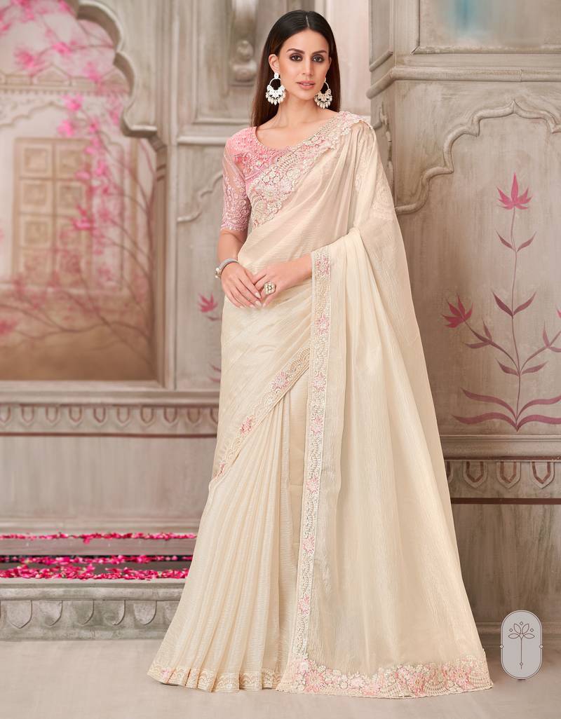 Cream soft silk blend embroidered saree with unstitched blouse piece