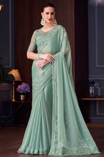 Sea green soft silk blend embroidered saree with unstitched blouse piece