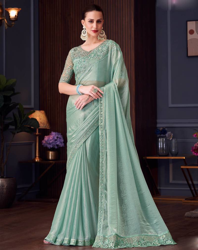 Sea green soft silk blend embroidered saree with unstitched blouse piece
