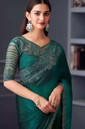 Turquoise satin embroidered saree with unstitched blouse piece