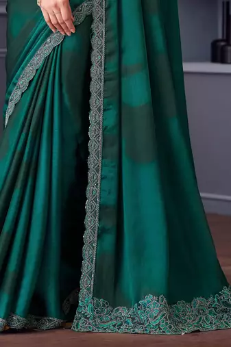 Turquoise satin embroidered saree with unstitched blouse piece