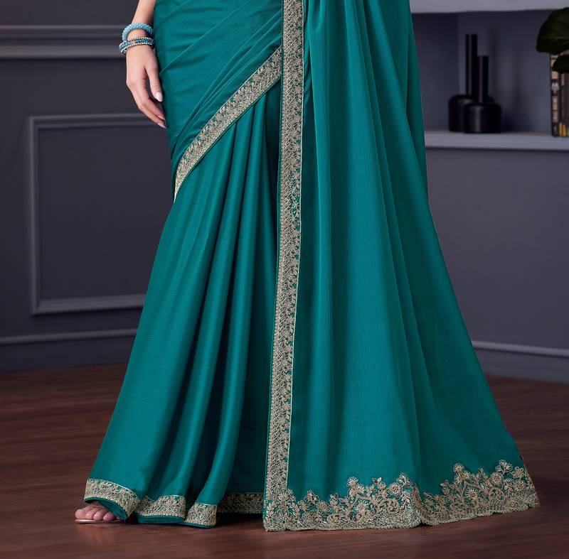 Teal silk blend chiffon embroidered saree with unstitched blouse piece