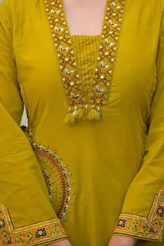 Mustard yellow pure cotton a-line kurta set with applique work and mirror embroidery