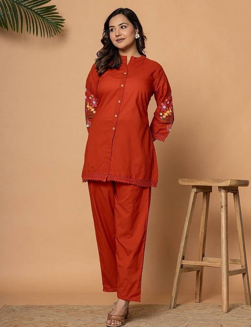 Rust pure cotton kurta pant set with floral embroidery