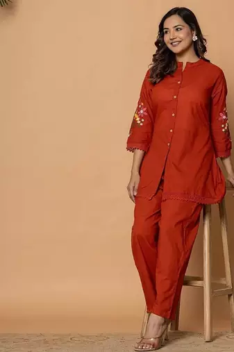 Rust pure cotton kurta pant set with floral embroidery