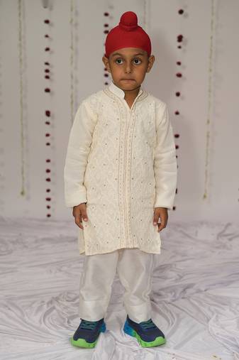 Ivory embroidered georgette kurta set