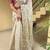 women's shimmer silk blend motiff embroidered saree with blouse piece