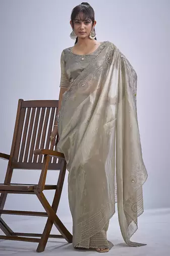 Beige sequin embellished border work silk saree for women