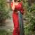 Red printed satin saree with blouse piece