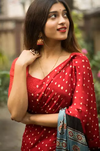 Red printed satin saree with blouse piece
