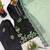 Black Roman Glass Silk Embroidered Kurta Set with green Dupatta and farsi salwar