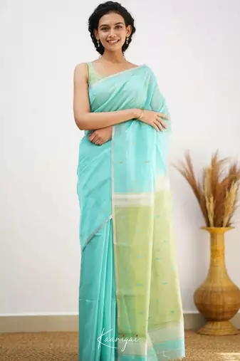 Turquoise linen slub jaquard designer saree with blouse