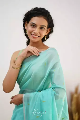 Turquoise linen slub jaquard designer saree with blouse