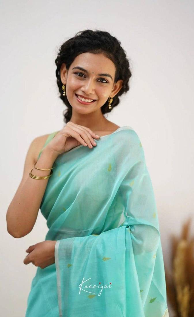 Turquoise soft linen slub jacuard work designer saree with blouse