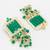  gold plated green stone heavy chandlier jhumka earrings