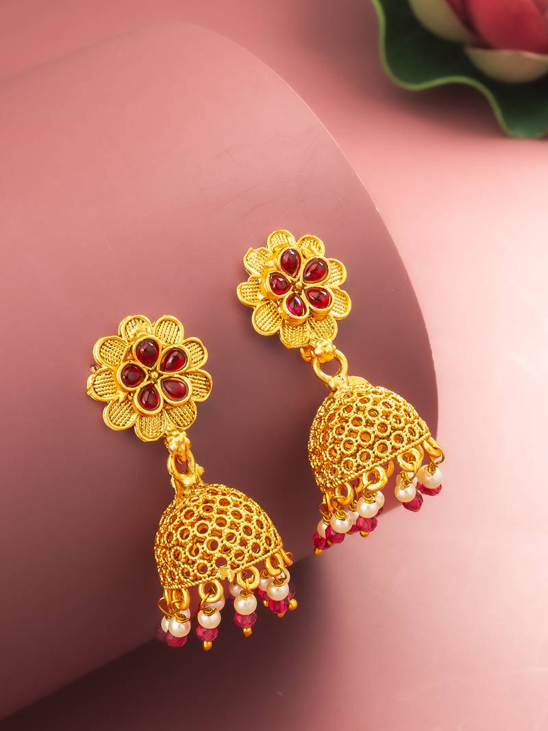  gold plated floral jhumka earrings with pink stone accents
