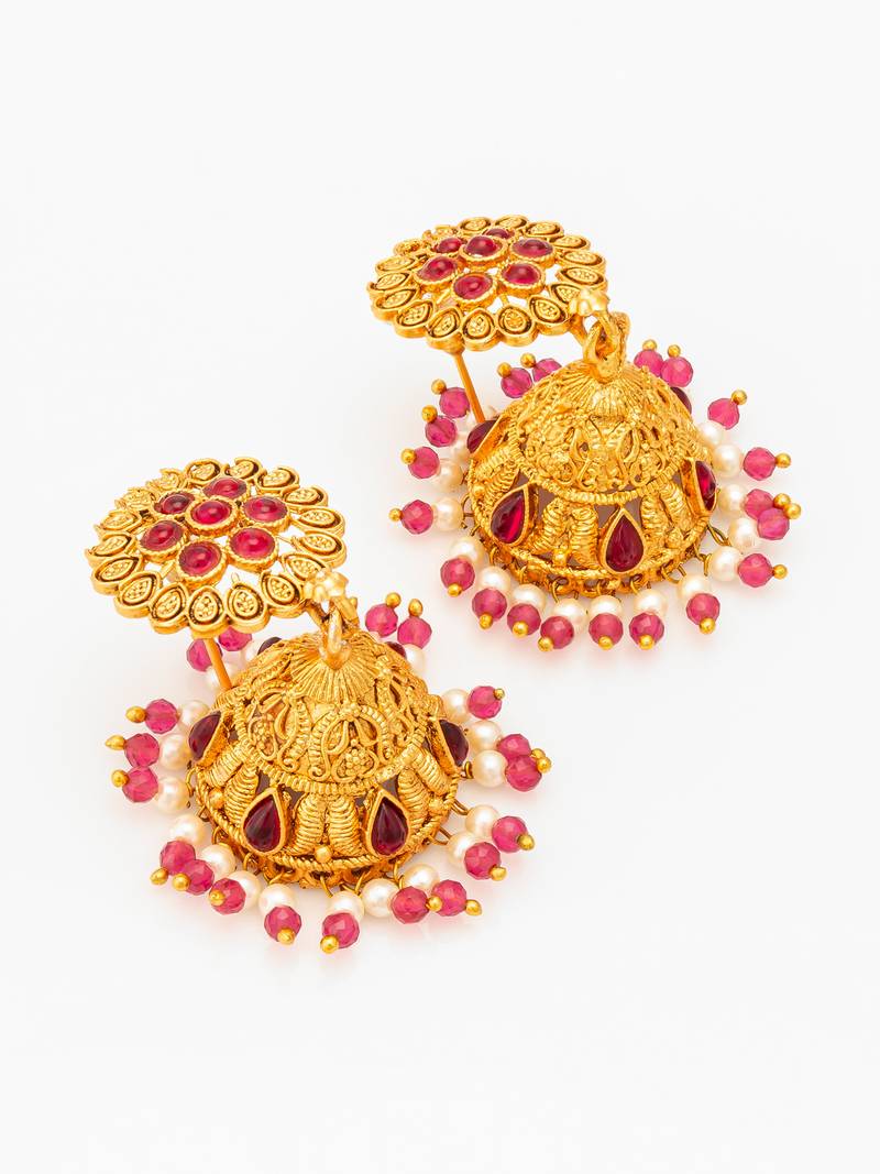  floral motif gold plated pink stone jhumka earrings