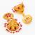  floral motif gold plated pink stone jhumka earrings