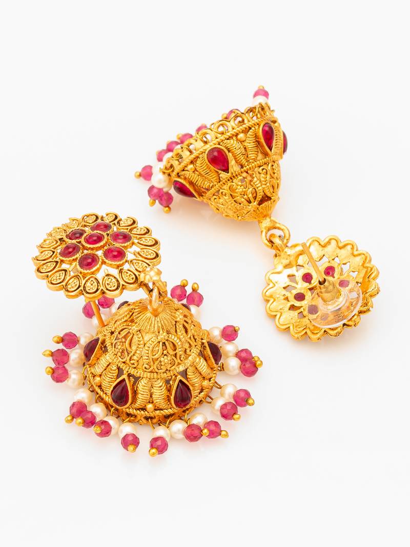  floral motif gold plated pink stone jhumka earrings