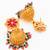  floral gold plated pink and green jhumka earrings
