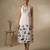 White embroidered cotton satin dress