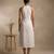 White embroidered cotton satin dress