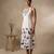 White embroidered cotton satin dress