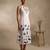 White embroidered cotton satin dress