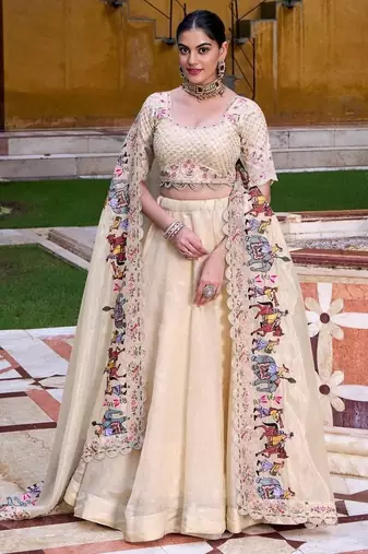 BEIGE EMBROIDERED WORK SILK LEHENGA CHOLI WITH DUPATTA.