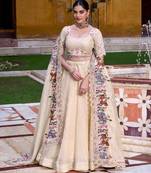 BEIGE EMBROIDERED WORK SILK LEHENGA CHOLI WITH DUPATTA.