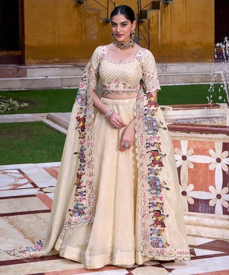 BEIGE EMBROIDERED WORK SILK LEHENGA CHOLI WITH DUPATTA.