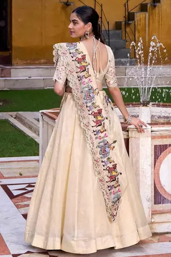 BEIGE EMBROIDERED WORK SILK LEHENGA CHOLI WITH DUPATTA.