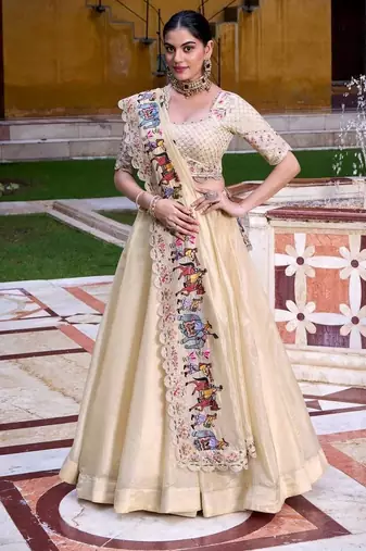 BEIGE EMBROIDERED WORK SILK LEHENGA CHOLI WITH DUPATTA.