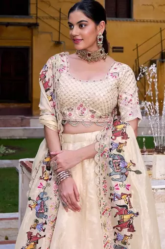 BEIGE EMBROIDERED WORK SILK LEHENGA CHOLI WITH DUPATTA.