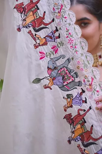 BEIGE EMBROIDERED WORK SILK LEHENGA CHOLI WITH DUPATTA.