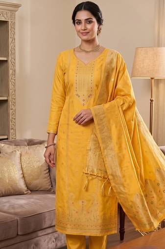 yellow silk blend zari woven dress material