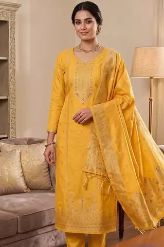 yellow silk blend zari woven dress material