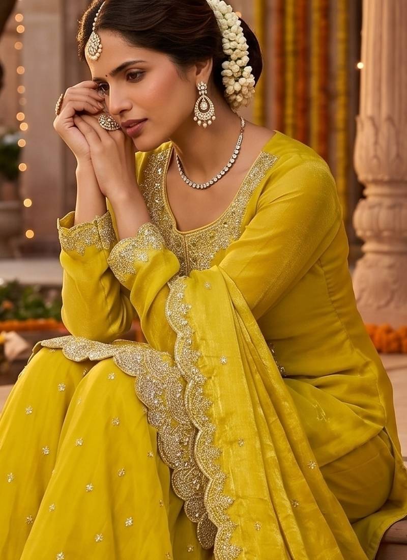 Tora silk embroidered palazzo suit with matching dupatta