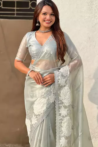 grey oris silk blend thread lotus embroidery cut work saree with blouse