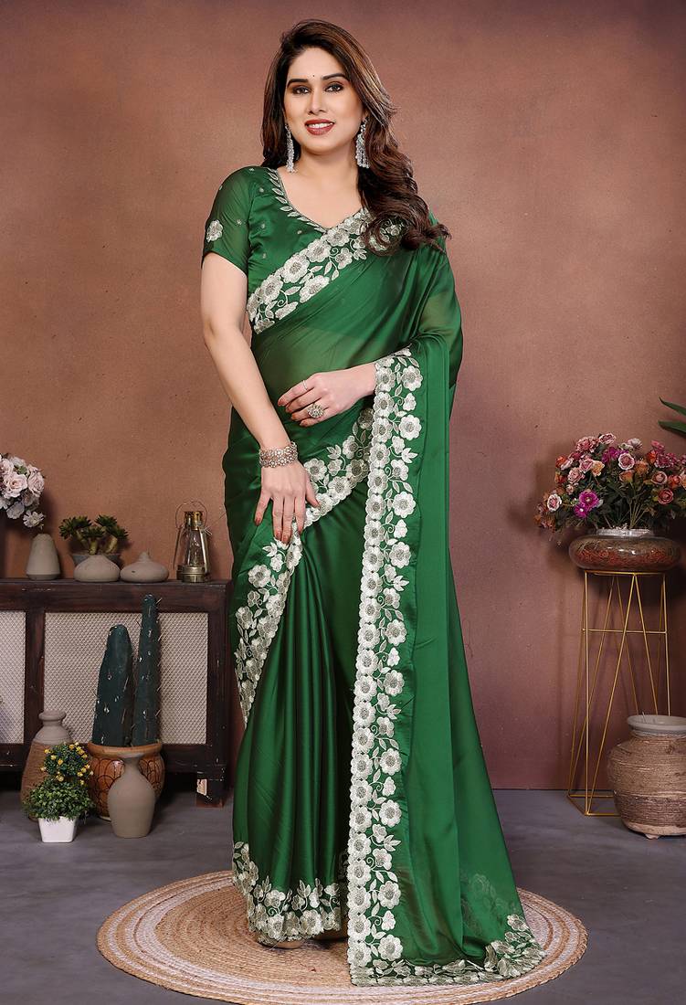 Green rangoli silk heavy thread embroidery work saree with blouse